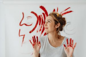 woman with red paint